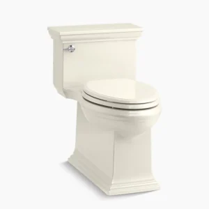 Kohler Memoirs Stately One-piece compact elongated toilet with skirted trapway, 1.28 gpf – Biscuit
